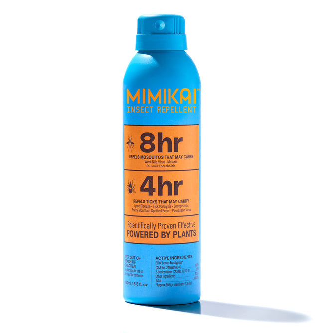 A blue can of MIMIKAI Mosquito & Tick Repellent Mist with orange text offers 8-hour mosquito and 4-hour tick protection. The label features plant-based, scientifically proven DEET alternative ingredients. Blue cap and shadow included.