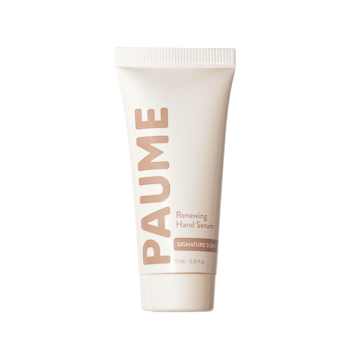 A small, cream-colored 10 mL squeeze tube of Renewing Hand Serum - Sample by PAUME with beige text on the packaging.