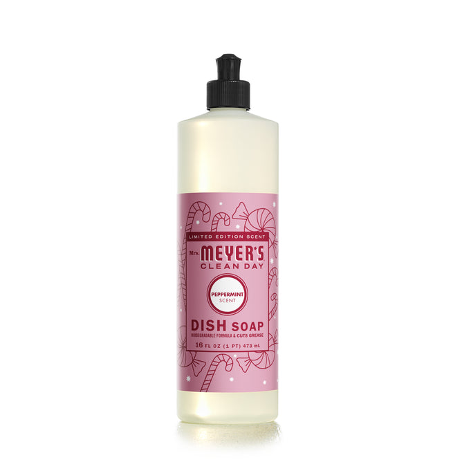 Mrs. Meyers Peppermint-scented Dish Soap comes in a 16 oz (473 ml) bottle with a pink label featuring candy canes and snowflakes, perfect for festive cleaning.