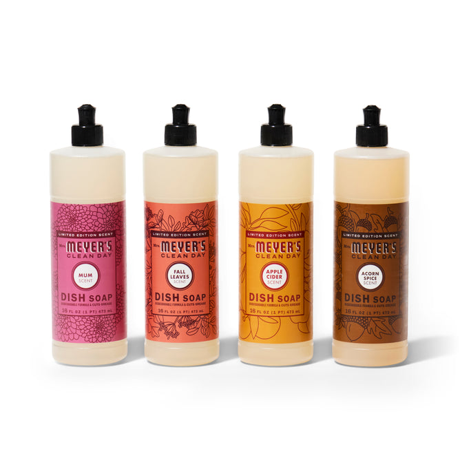 Four bottles from Mrs. Meyer’s Fall Dish Soap Collection are arranged in a row against a white background.