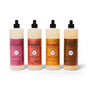 Four bottles from Mrs. Meyer’s Fall Dish Soap Collection are arranged in a row against a white background.