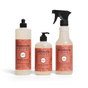 The Mrs. Meyer's A Very Merry Kitchen Set includes dish soap, hand soap with pump, and multi-surface cleaner spray in peony scent, all in matching floral peach bottles.
