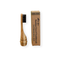 A Me Mother Earth All-in-One Bamboo Travel Toothbrush 2.0 Head - Refill with charcoal bristles sits next to a brown box labeled with the product name.