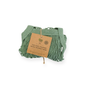 A folded green mesh market bag from Me Mother Earth, made of organic cotton, rests on a white background. Its cardboard tag reads: The "One Tripper" Expandable Mesh Market Bag.