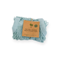 A light blue "One Tripper" Expandable Mesh Market Bag by Me Mother Earth, made of 100% organic cotton, with a brown tag, is folded on a white background, showcasing its reusable design.