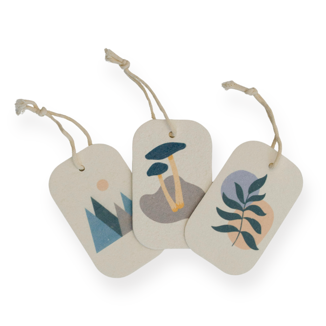 Me Mother Earth’s Pop Up Dish Sponges 3-Pack comes with three rectangular tags—each with minimalist art: blue mountains, mushrooms on a rock, and a green plant. Perfect sustainable accents for your eco-friendly sponge packaging.
