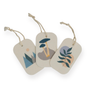 Me Mother Earth’s Pop Up Dish Sponges 3-Pack comes with three rectangular tags—each with minimalist art: blue mountains, mushrooms on a rock, and a green plant. Perfect sustainable accents for your eco-friendly sponge packaging.