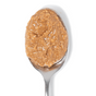 A spoonful of Big Spoon Roasters Maple Cinnamon Peanut & Pecan Butter rests on a plain silver spoon against a white background.