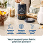 A hand scoops Ancient Nutrition Multi Protein Powder Animal Based + Creatine from a container on a kitchen counter with a blender, milk, and bananas. Icons highlight support for muscle strength, cognitive performance, and joint health.