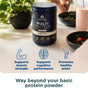 A container of Ancient Nutrition Multi Protein Powder Animal Based + Creatine sits on a table near a smoothie, food bowls, and plants. Icons and text highlight benefits: supports muscle strength, cognitive performance, and healthy joints.