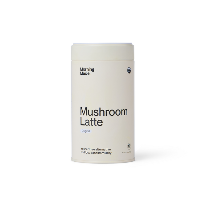 Morning Made’s Mushroom Latte - Original (60 servings) is a coffee alternative featuring Chaga and Lion’s Mane for focus and immunity. The off-white, minimalist cylindrical container comes with a sealed lid.