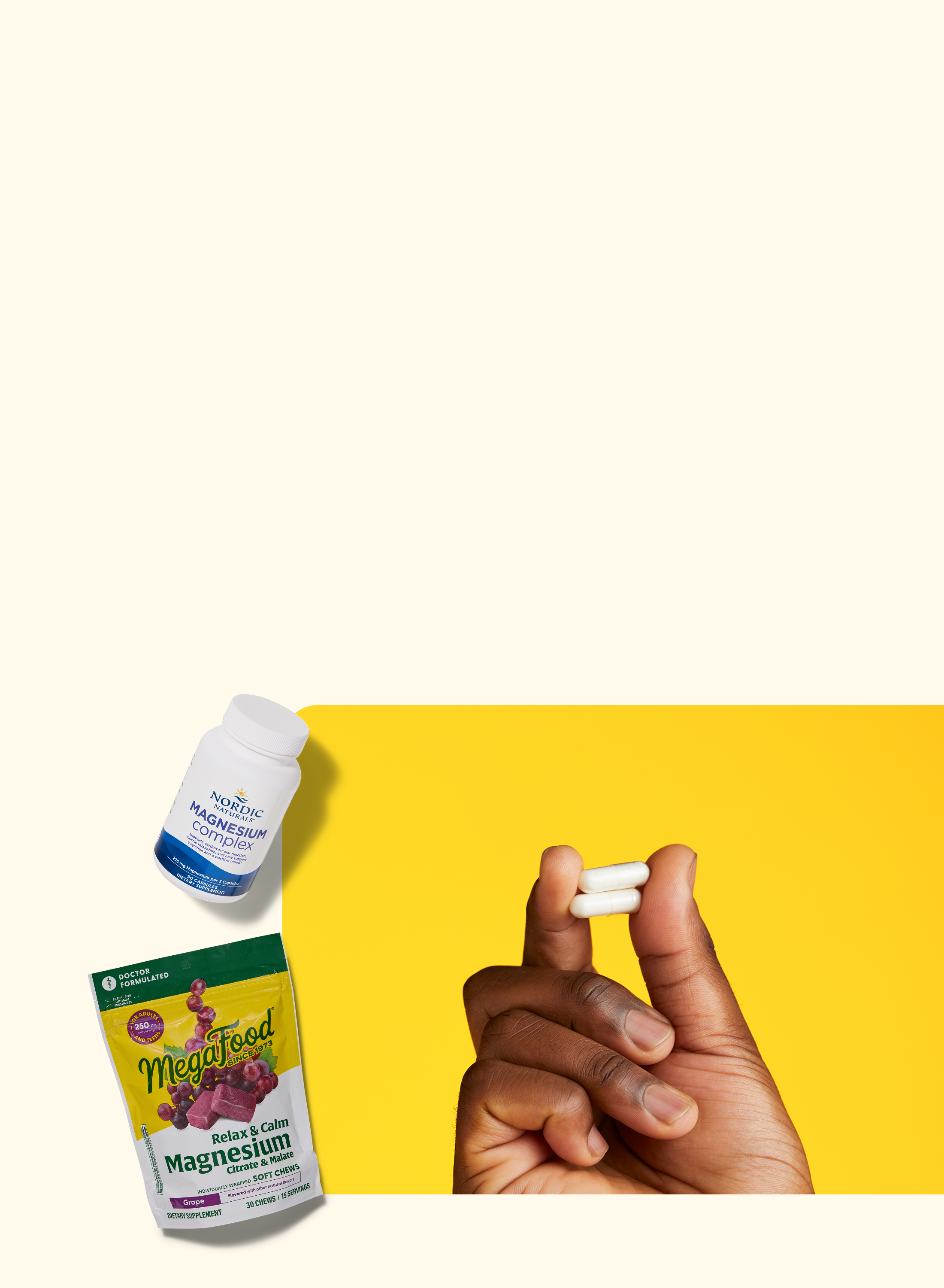 A hand holds two white pills against a yellow background. Next to the hand are a white bottle labeled “Nordic Naturals Magnesium Complex” and a green bag labeled “MegaFood Relax + Calm Magnesium.”.