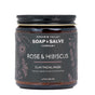 A 4 oz dark amber jar from Chagrin Valley Soap & Salve, labeled "Rose & Hibiscus Clay Face Mask," features floral designs and highlights organic hibiscus and French Pink Kaolin Clay. Ideal for dry, sensitive, or maturing skin.
