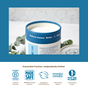 Open container of Meliora Oxygen Brightener Refill, an eco-friendly laundry booster, on a white surface with green leaves in the background. Four certification logos and text highlight sustainable, women-owned, eco-friendly practices.