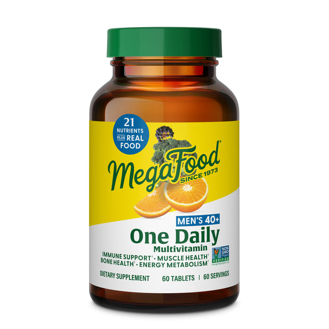 A brown bottle of MegaFood Men's 40+ One Daily, with a green cap and yellow label showing oranges and greens, supports immune health, muscle and bone strength, energy metabolism, and prostate health—ideal for men over 40.