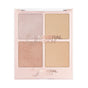 The Mineral Fusion Highlighter Palette features four shimmery highlighter shades—light pink, gold, bronze, and champagne—in a square compact for a radiant glow.