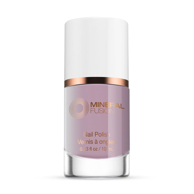 A 10mL bottle of Mineral Fusion Nail Polish in light mauve, vegan and chip-resistant, with a shiny white cap, metallic copper band, and gold label text.