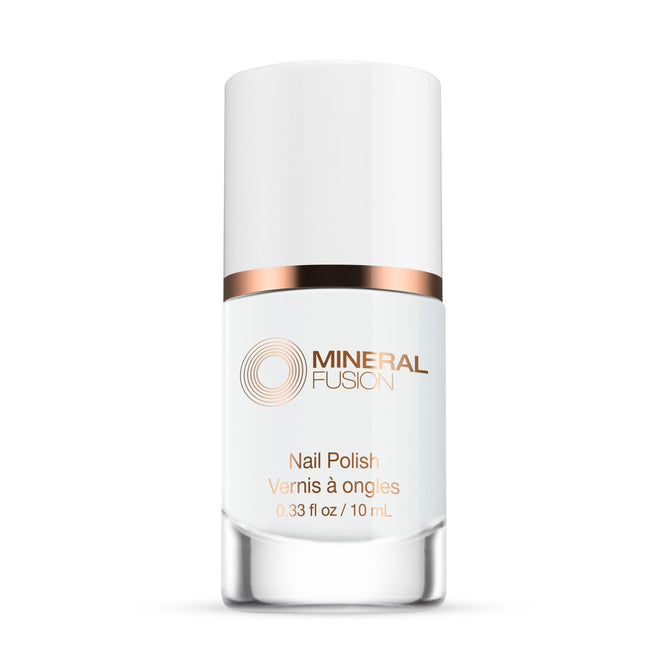 A 0.33 fl oz (10 mL) bottle of Mineral Fusion Nail Polish with a white cap, rose gold band, and gold/orange label text. The chip-resistant formula is vegan.