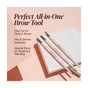 Three pink Mineral Fusion Retractable Brow Pencils with spoolie brushes and fine tips are arranged on white notepads. These pencils, enriched with mineral pigments, fill and define brows for a natural look while the spoolie shapes and blends.