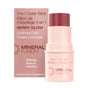 A pink tube of Mineral Fusion 3-in-1 Color Stick in Berry Glow stands before its matching box, showing its cheek and lip tint uses, with English and French product details on both the packaging and stick.