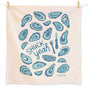 The Neighborgoods Dish Towel features blue oyster shells, lemon wedges, a fork, and an oyster knife on beige unbleached cotton. “SHUCK yeah” pops at the center. Absorbent, hand-packaged in the USA.
