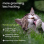 A cat grooms itself in the grass next to Native Pet Hairball Support Supplement for Cats, which promotes skin and gut health, natural hairball removal, and normal shedding.