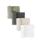 Four folded Naturepedic Organic Breathable Swaddle Blankets, in olive green, dark gray, beige, and white, are stacked diagonally on a white background. This multi-color pack is made from GOTS certified organic cotton for breathability.