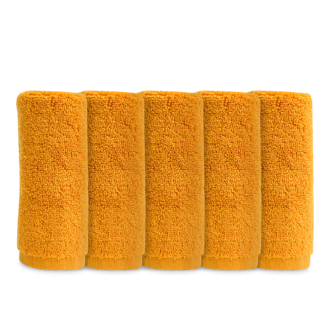 Five orange Natemia Organic Super Absorbent Washcloths, made from 100% GOTS Certified Organic Cotton, are lined up vertically side by side on a plain white background.