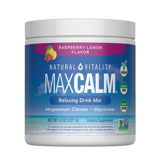 A white container of Natural Vitality Calm Magnesium Powder, a raspberry-lemon magnesium supplement drink mix. The label notes stress relief, magnesium citrate and glycine, vegan, certified raw, and non-GMO project verified.