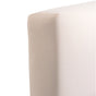 Close-up of the Naturepedic Organic Breathable 2-Stage Baby Crib Mattress shows its textured white cover, highlighting the breathable material’s pattern and the clean, sharp edge of this premium crib mattress.