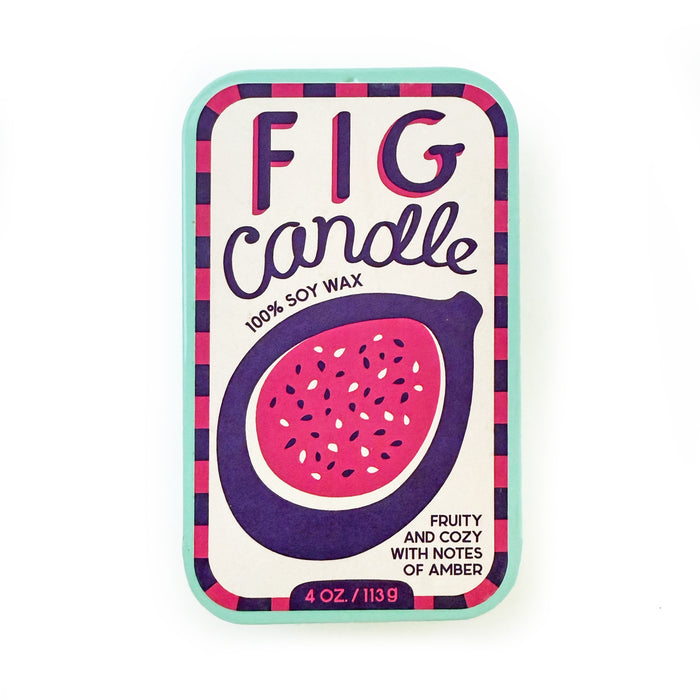 The Neighborgoods soy wax candle in a rectangular sardine tin, featuring a graphic label with a cross-section of a fig and text reading Fig Candle 100% soy wax, fruity and cozy with notes of amber, 4 oz./113 g.