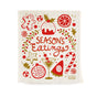 Happy Holidays Sponge Cloth, an off-white eco-friendly sponge cloth with red and gold holiday illustrations of a gingerbread man, fruit, a martini glass, and a candy cane, featuring the text SEASONS EATINGS in the center.