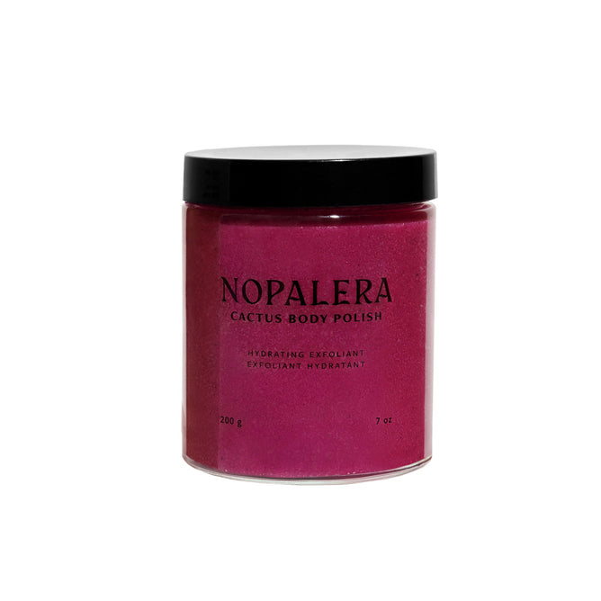NOPALERA Cactus Body Polish is a bright pink hydrating exfoliant and moisturizer in a 200g (7oz) clear jar with a black lid, leaving skin radiant and nourished.
