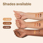 Three forearms of varying skin tones display Oceanly Bronzer swatches (1 Golden, 2 Coffee, 3 Ebony) from ATTITUDE, highlighting available shade options. 