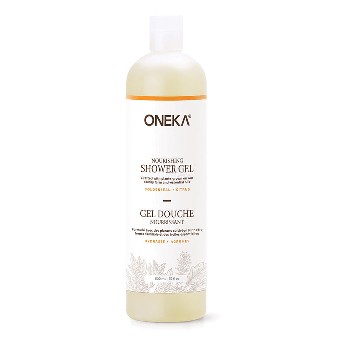 A clear plastic 500 mL (17 fl. oz.) bottle of Oneka Shower Gel - Goldenseal and Citrus, with gold and black text on a white label, features moisturizing hemp oil and a white flip-top cap.