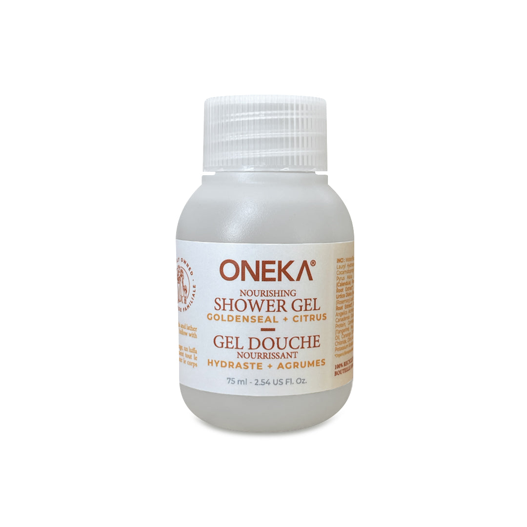 A 75 mL clear plastic bottle of Oneka Shower Gel - Goldenseal and Citrus with a white screw cap. Features English and French text, is enriched with hemp oil, essential oils, and is an organic body care product.