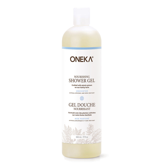 A clear plastic bottle of Oneka Shower Gel - Unscented, 500 ml (17 fl oz), with a white label featuring blue and gold text plus botanical illustrations; this hypoallergenic body wash is ideal for sensitive skin.