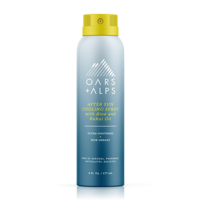 A blue and yellow spray can of Oars + Alps Aloe Cooling Spray with Aloe Vera, Kukui Oil, and Niacinamide. The label highlights its ultra-soothing, non-greasy formula thats paraben-, phthalate-, and sulfate-free.
