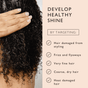 A person applies UpCircle Hair Serum with Rice Water + Baobab to curly, wet hair. Text reads: “Develop healthy shine by targeting: hair damaged from styling, frizz and flyaways, very fine hair, coarse dry hair, and heat damaged hair.” This nourishing serum with upcycled rice water and baobab provides effective frizz control for all hair types.