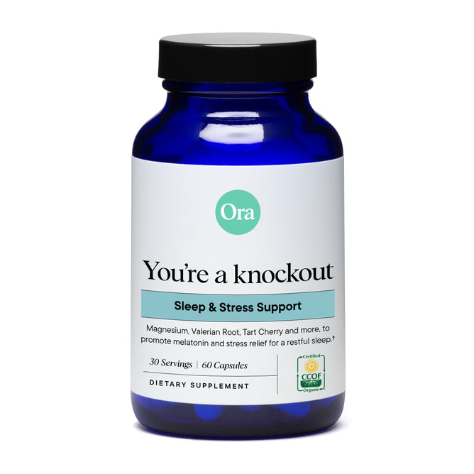 Ora Organic’s You're a Knockout Sleep & Stress Support Capsules come in a blue bottle with 60 capsules, featuring magnesium, valerian root, and plant-based melatonin to support natural sleep and restful nights.