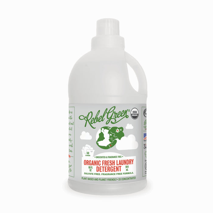A white bottle labeled Rebel Green Fresh Laundry Detergent Liquid - 3x Concentrated, featuring organic and gentle ingredients.