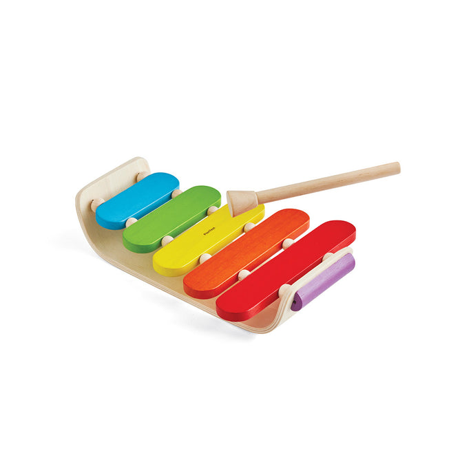 The PlanToys Wooden Oval Xylophone for Toddlers features six colorful bars and a wooden mallet, making it a charming and sustainable musical toy ideal for introducing little ones to music.