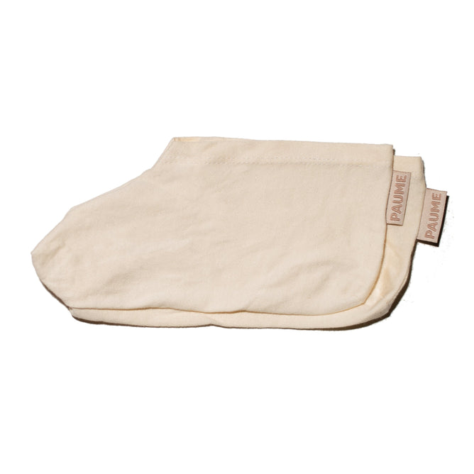 Cream-colored, reusable Cotton Overnight Socks by PAUME with a branded tag, shown on a white background—ideal for pairing with your Hand and Foot Hydration Mask to lock in moisture.