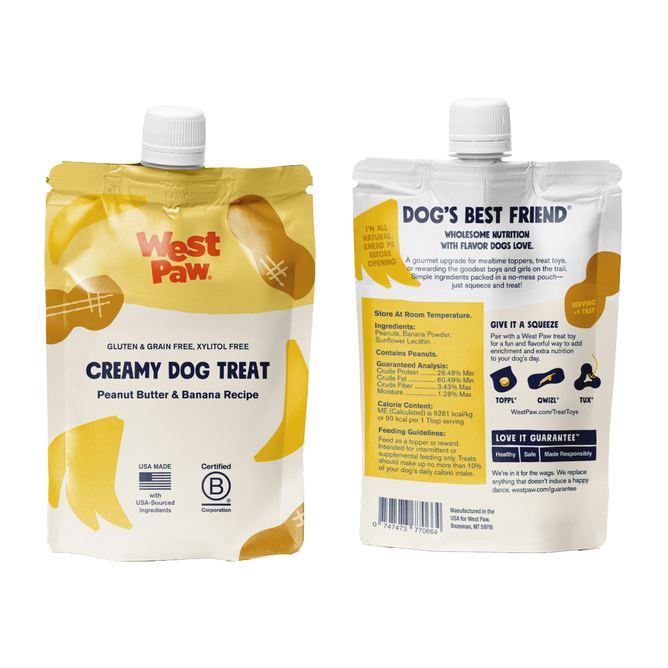 Two yellow pouches of West Paw Peanut Butter Banana Creamy Dog Treat are shown front and back, featuring the brand and product name. Feeding instructions and nutrition details are displayed on the back.