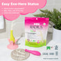 A pink bag of Radius Kids EcoFlex™ Refill Bag stands on a counter with a kids floss pick displayed on a pink stand and several lying nearby; text highlights that each eco-friendly floss pick is compostable, BPA/PFAS/PTFE-free, and USDA bio-preferred. Plants and badges appear in the background.