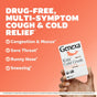 Hand holding a box of GENEXA Kids Cold Crush children’s cold medicine with text: Drug-free, multi-symptom relief for cough & cold—congestion, mucus, sore throat, runny nose, and sneezing.