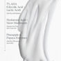 A white, creamy texture of Andalou Naturals Resurfacing Overnight Glycolic Serum is shown, with text listing key ingredients: 7% AHA (Glycolic Acid + Lactic Acid) for smoothing and gentle renewal, Hyaluronic Acid + Snow Mushroom for deep hydration and plumping, and Pineapple & Papaya Enzymes to gently resurface skin for a radiant glow. Each ingredient’s benefit is highlighted, emphasizing the serum’s smoothing effect from lactic acid and the gentle exfoliation provided by fruit enzymes.
