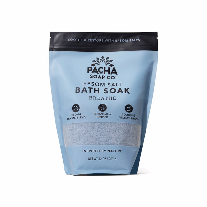 A blue 32 oz. bag of Pacha Soap Co. Breathe Salt Soak, featuring Epsom salt, sea salt, eucalyptus oil, and botanically infused aromatherapy. The upright bag is displayed against a white background.