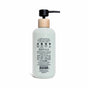A light green bottle of Pacha Soap Co. Body Lotion features a wooden collar, black pump, and a back label with usage instructions, ingredients, and brand info. Enriched with hydrating coconut oil and shea butter.