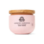 A pink jar of Pacha Soap Co. Body Scrub, featuring a wooden lid, whipped texture, and soft pumice for gentle exfoliation. Contains 15 oz (425 g) and displays a simple black logo and text.